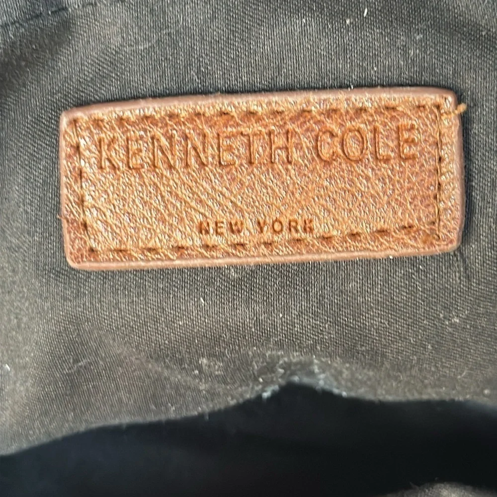 Kenneth Cole straw bag in back with tan straps